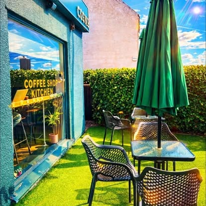 Alfresco dining in the sunny garden at Cigno, Burntwood